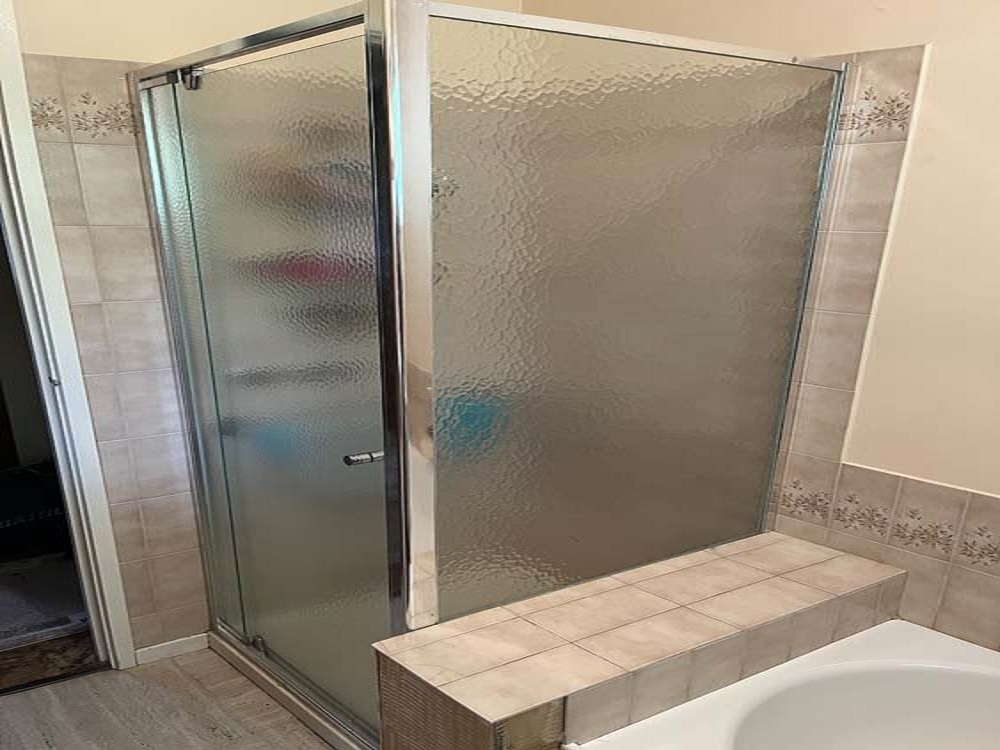 Broken glass in shower screen in Rosebud